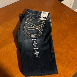 Ariat mid rise boot cut jeans. New with tags.